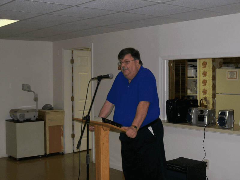 Rev. John Franich preaching in ministry