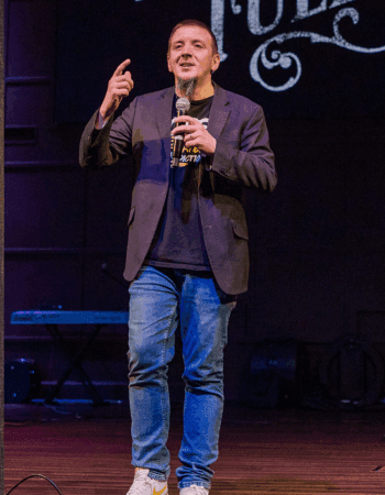 Justin Franich speaking at a church