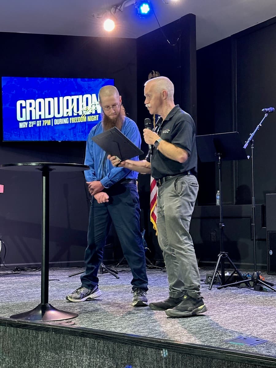 Teen Challenge graduation ceremony on stage